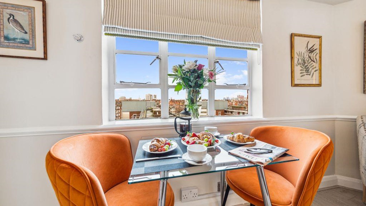 Apartment 746 — bright bedroom with city views